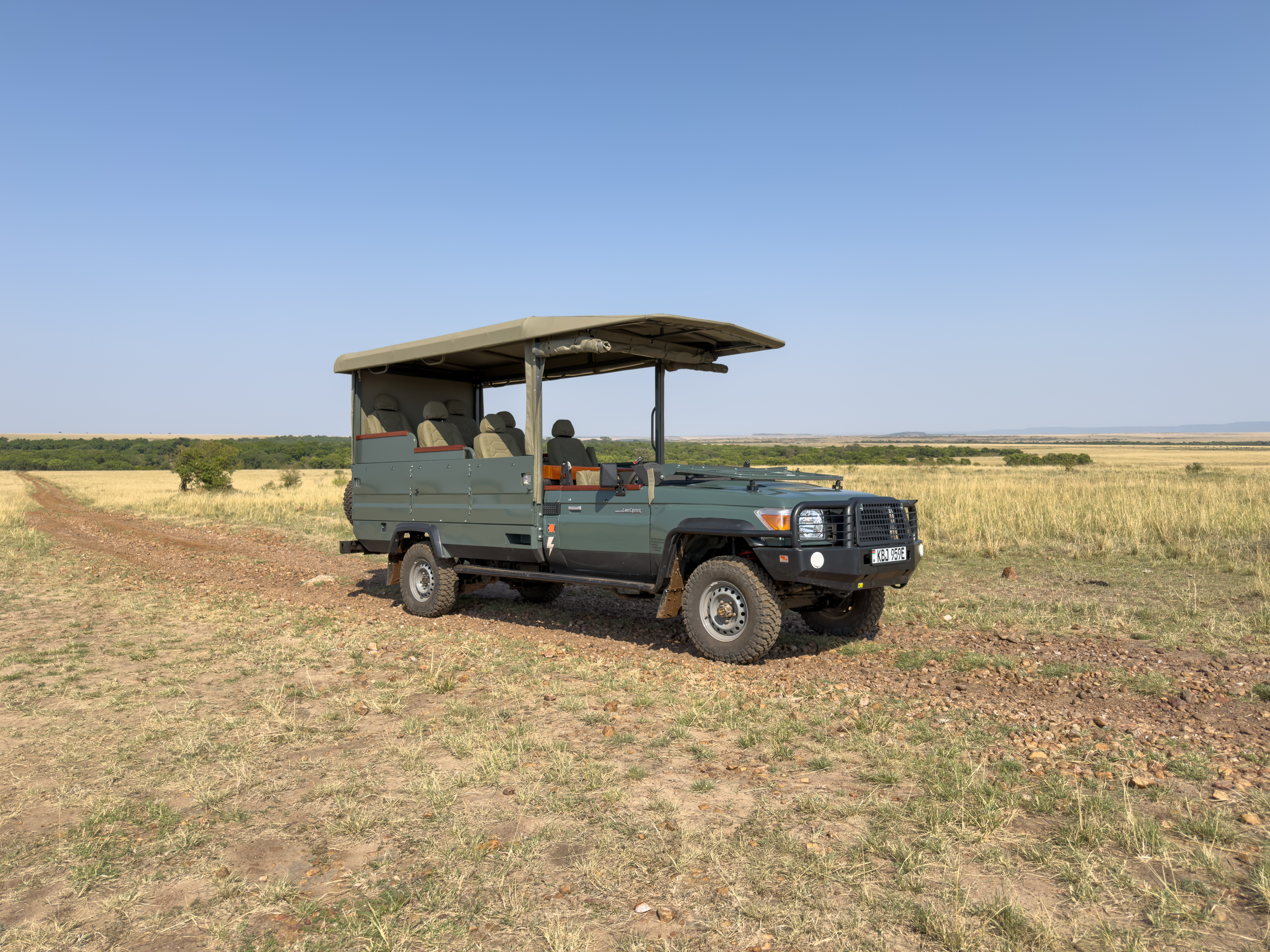 Electric Land Cruiser side view in the savannah